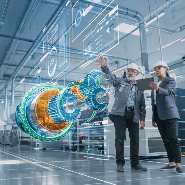 Factory Digitalization: Two Industrial Engineers Use Tablet Computer, Visualize 3D Model of Clean Green Energy Engine. Industry 4 High-Tech Electronics Facility with Machinery Manufacturing Products