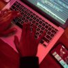 Close-Up Shot of a Person Using a Laptop