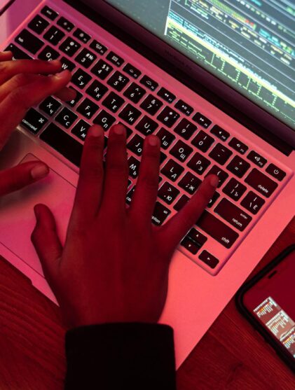 Close-Up Shot of a Person Using a Laptop