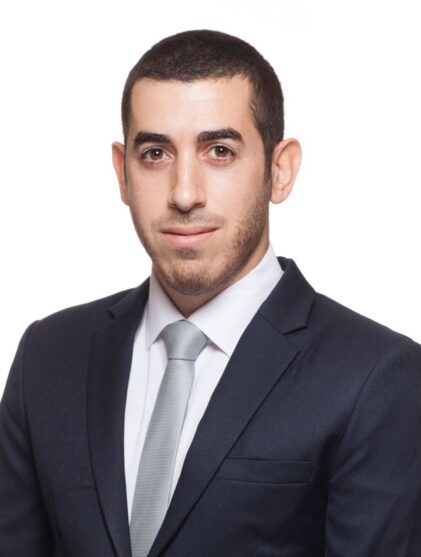 Daniel Nigriman in suit