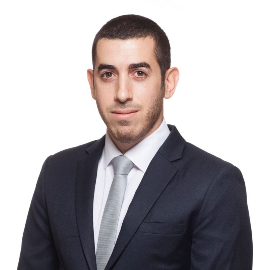 Daniel Nigriman in suit