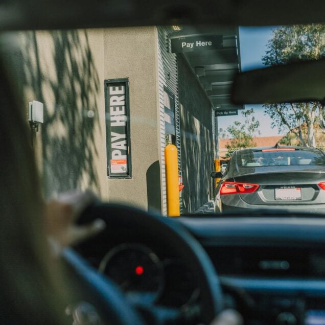 Driver inside a Car on a Drive Thru