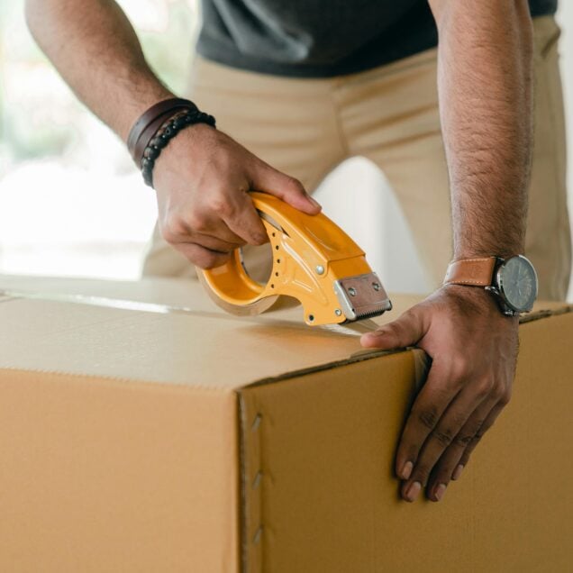 taping a cardboard box