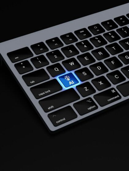 black keyboard with a blue button