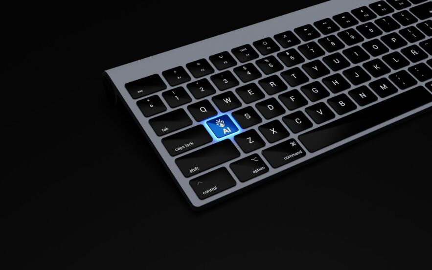 black keyboard with a blue button