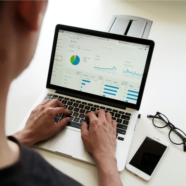 person using a macbook