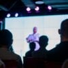 audience listening to a speaker