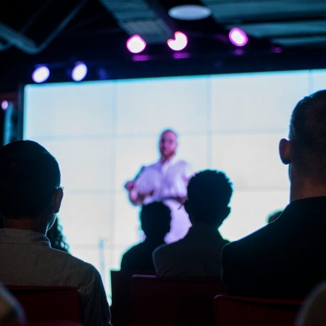 audience listening to a speaker