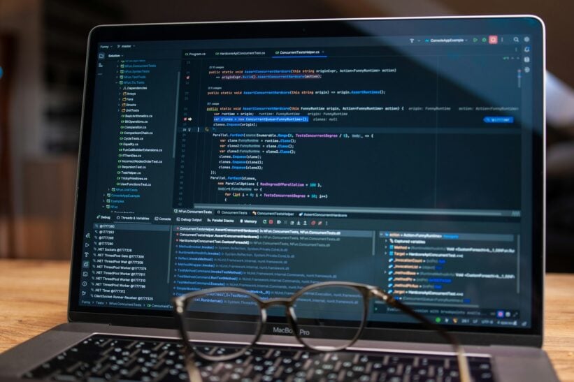 laptop screen with lines of code